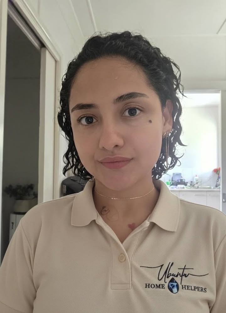 Katherine García wearing an Ubuntu Home Helpers polo
